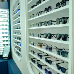 Sunglasses on the rack of the leading optical shop in Qatar.
