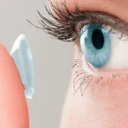 A woman wearing contact lenses from a premium optical shop in Qatar.